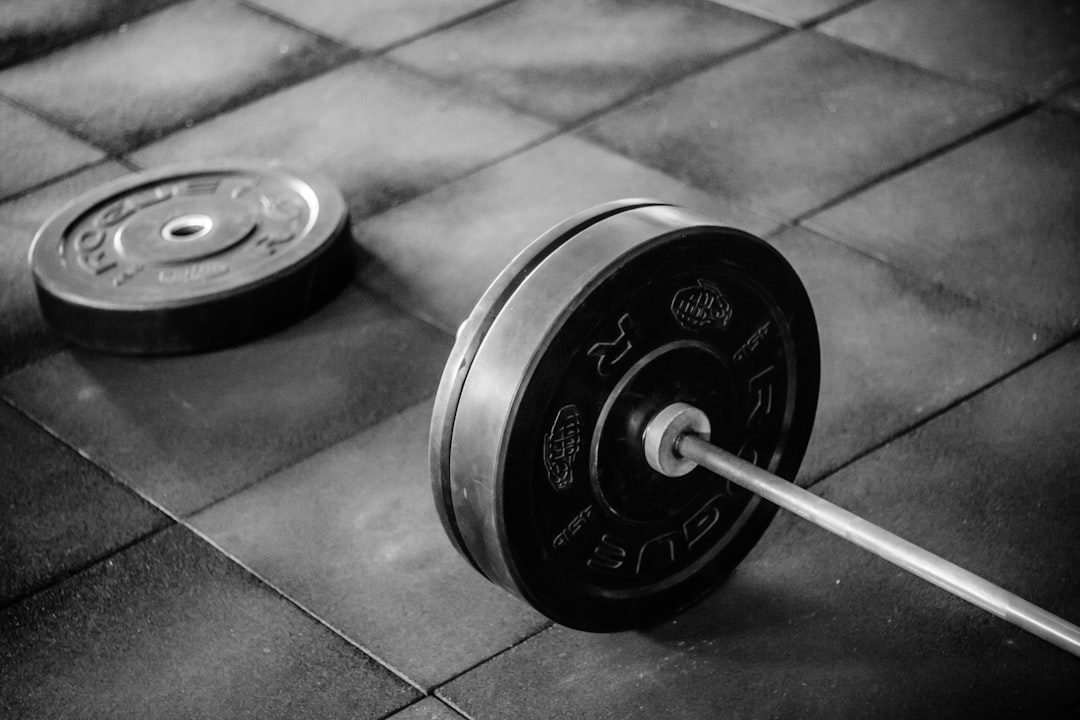 Barbell and strength training equipment at the Pro Ultimate Gyms strength zone